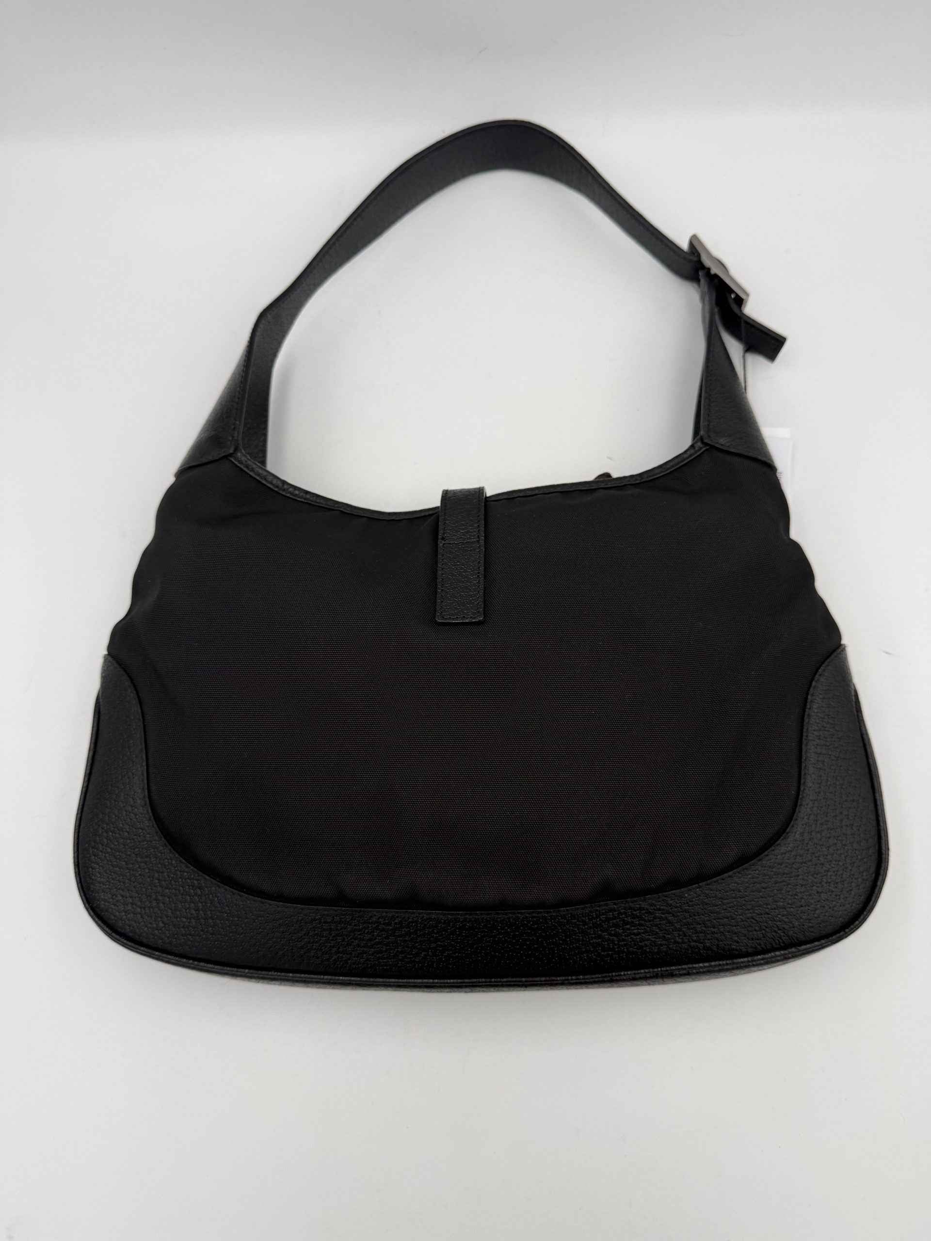 GUCCI JACKIE Leather and Canvas Handbag